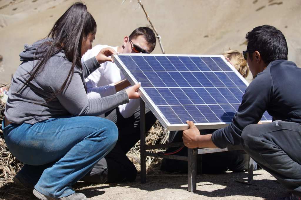 ISZL students setting up solar panels in Ladakh, India.